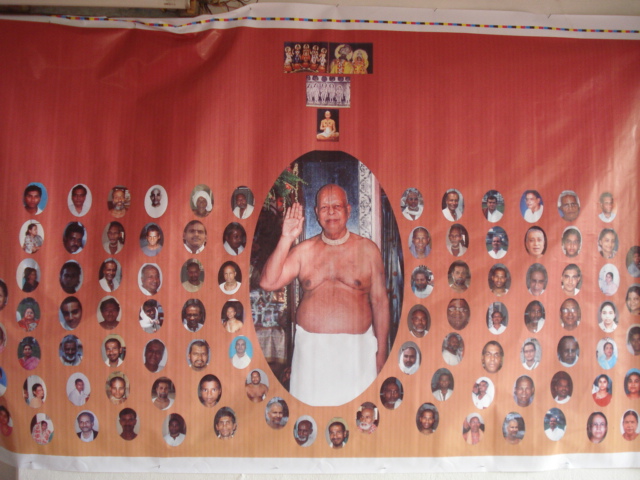 Baba surrounded by devotees