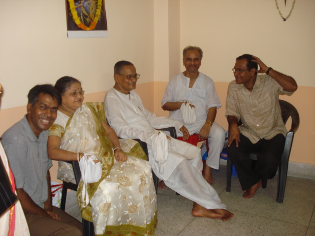 From left  - Sukumar-da, Himansu Aunty, Himanshu Uncle with some devotees