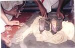 Paadukaa (sandals) of Srila Kabiraj Goswami.