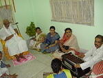 Baba immersed in kirtan relish. The one in blu sari is the prettiest friend i evr met...Sanjukta !