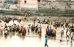 Devotees  thronged to serve Radhakund.